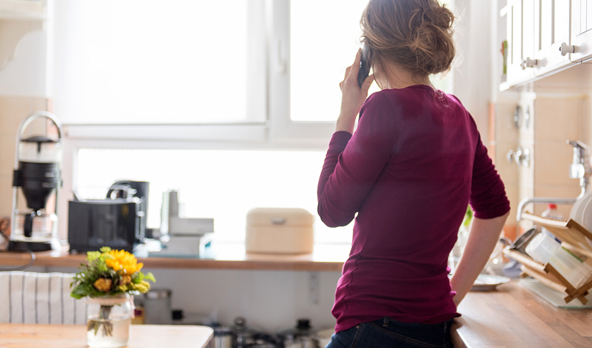 Women purple shirt on phone